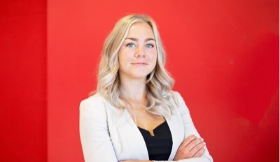 female business student poses for picture